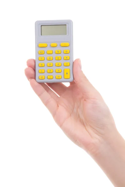 Mão de mulher segurando a calculadora de bolso isolada no branco — Fotografia de Stock