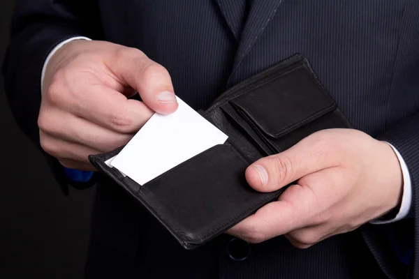 Purse with visiting card in business man hand — Stock Photo, Image