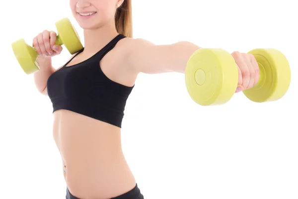 Jovem mulher segurando halteres isolados no branco — Fotografia de Stock