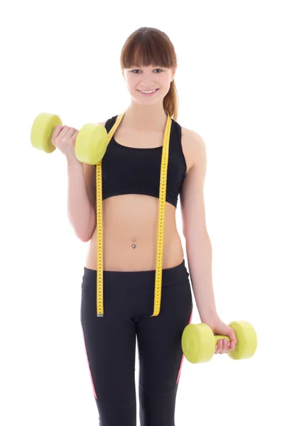 Young beautiful slim woman with dumbbells and measure tape isola — Stock Photo, Image