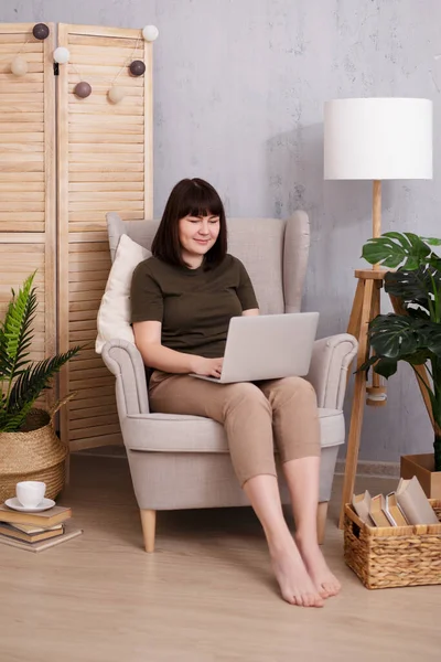 Happy Woman Sitting Armchair Using Laptop Home — Stock fotografie