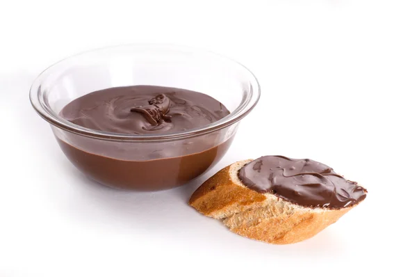 Chocolate spread on baguette — Stock Photo, Image