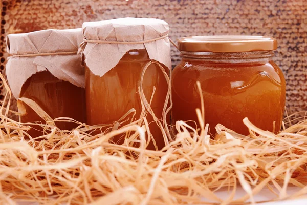 Jar with honey — Stock Photo, Image