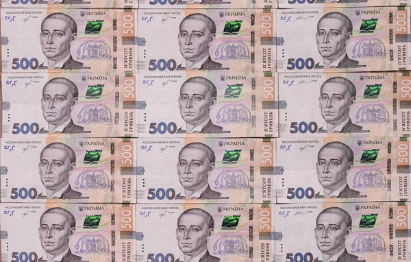 Pengar bakgrund av sedlar i ukrainska hryvnia. — Stockfoto
