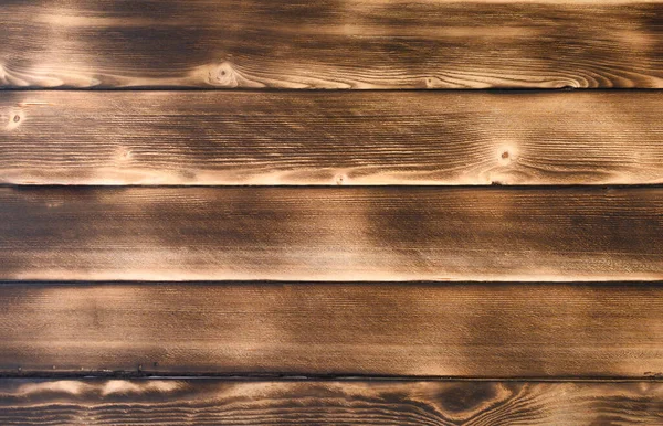 Textuur planken van donkerbruin oud hout. — Stockfoto