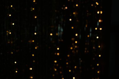 Altın soyut bokeh arka plan. Soyut şenlik yılbaşı ışıkları dağıtıldı. Noel ve Yeni Yıl.