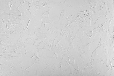 Beyaz alçıtaşlı duvar, çimento desenli arka plan.