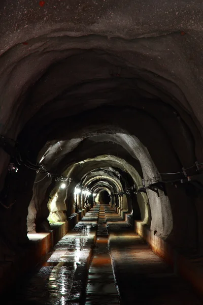 Dark tunnel with light — Stock Photo, Image