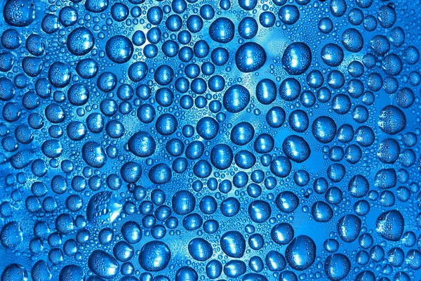 Wassertropfen auf Glasoberfläche — Stockfoto
