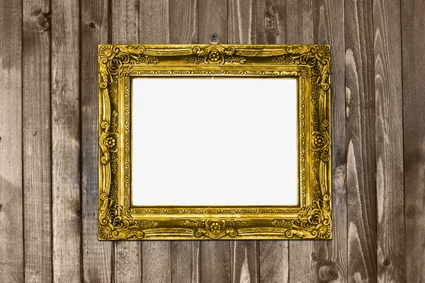 Zlatý starožitný textura rámu visí dřevěné wal — Stock fotografie