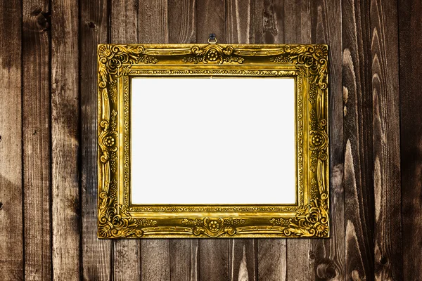 Zlatý starožitný textura rámu visí dřevěné wal — Stock fotografie
