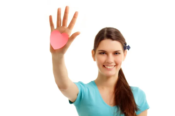 Happy teen girl holding in hand heart love symbol valentine — Stock Photo, Image