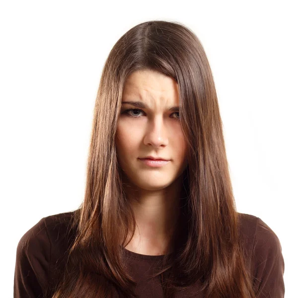 Attracive teen girl makes a grimace displeased isolated on white — Stock Photo, Image