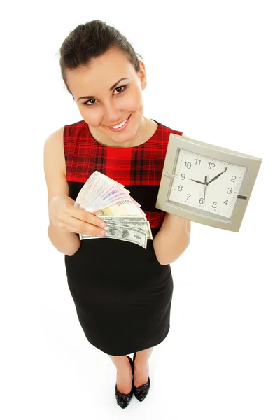 Time is money - business woman cheerful holding clocks and cash i — стоковое фото