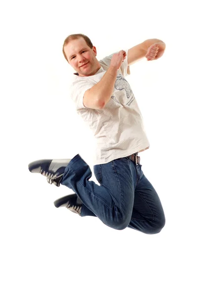 Jumping joven aislado en blanco —  Fotos de Stock