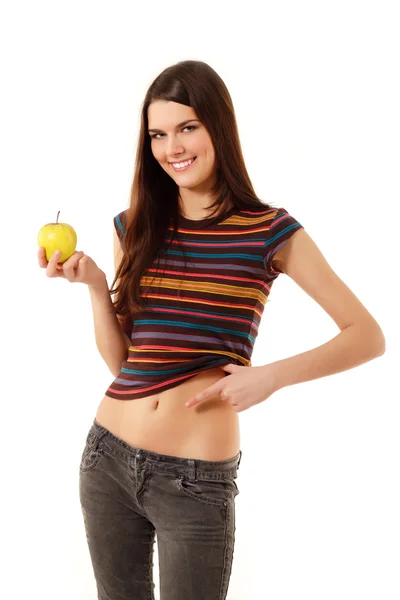 Teen girl cheerful slim with apple show belly isolated on white — Stock Photo, Image