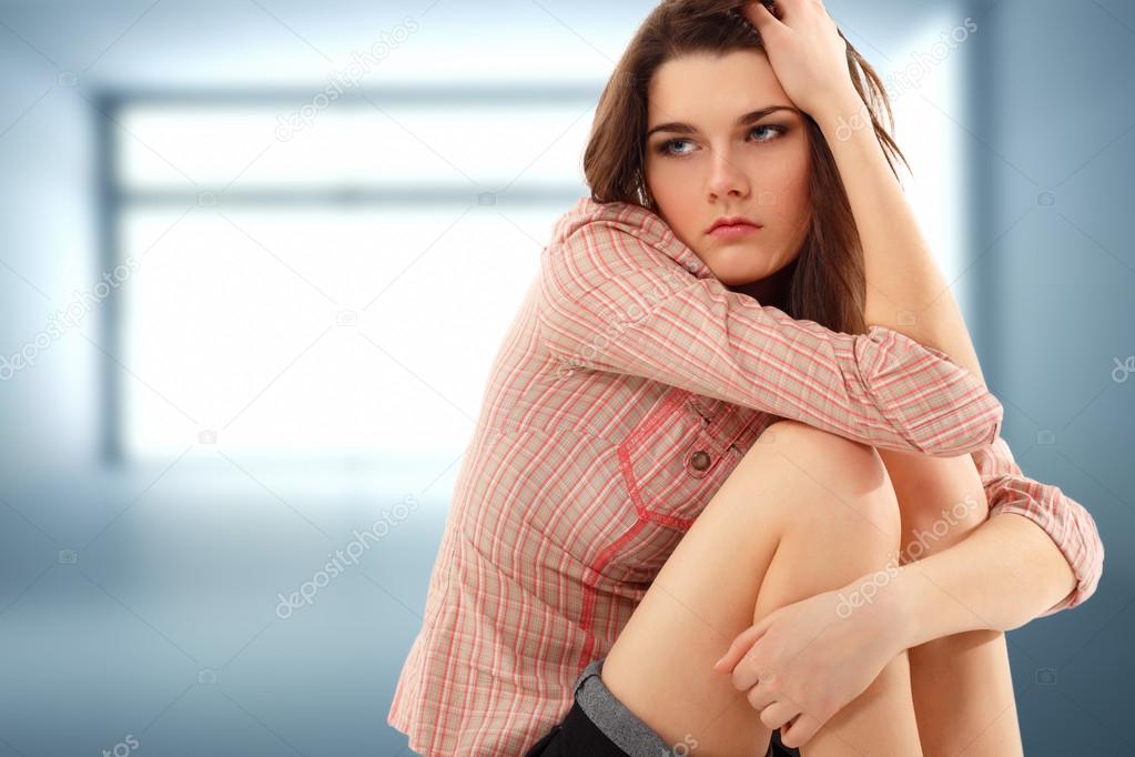 depression teen girl lonely in empty room