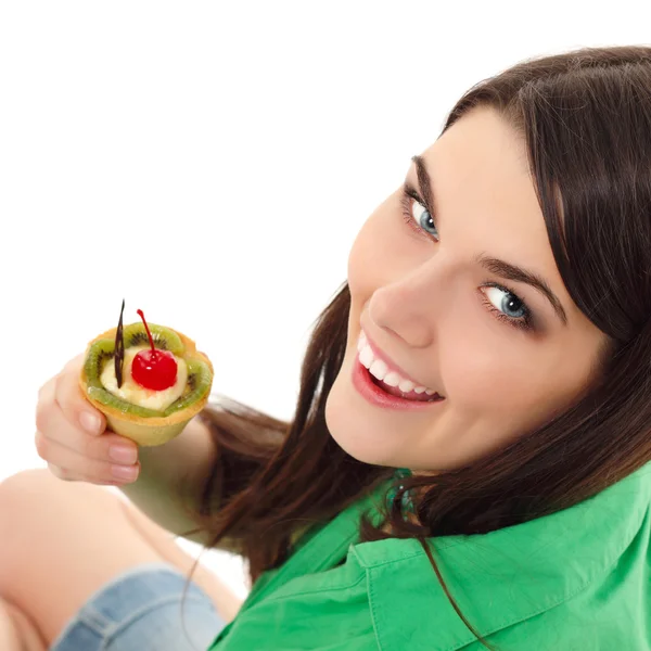 Hermosa adolescente chica comer dulce pastel — Foto de Stock