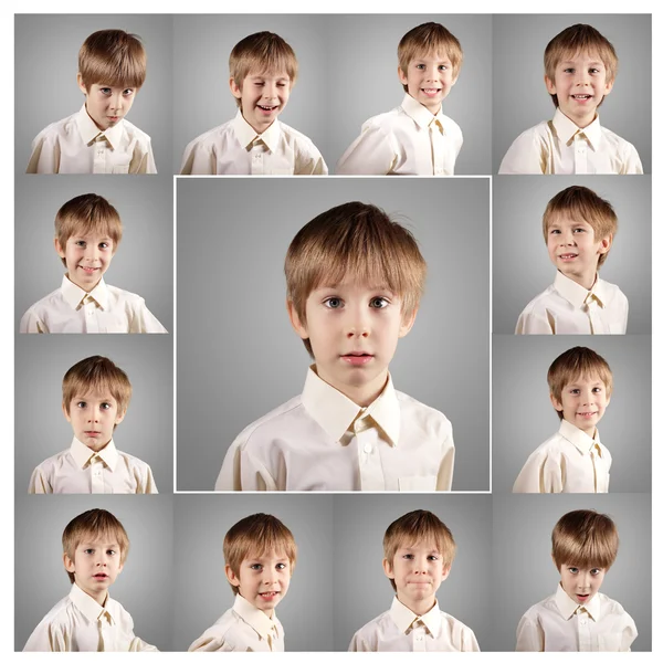 Çocuk küçük duygusal çekici set yüzler yapmak — Stok fotoğraf