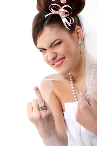 Cute young playful bride showing wedding ring and makes faces — Stock Photo, Image