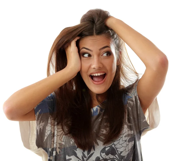 Adolescente chica atractiva sorprendida hacer caras aisladas en blanco — Foto de Stock