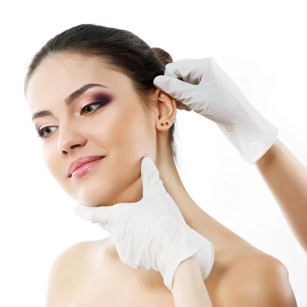 Beautiful young woman face with beauty treatment ear plastic — Stock Photo, Image