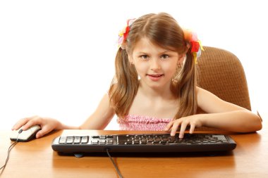 Child with internet dependence with keyboard looking at camera like in monitor clipart