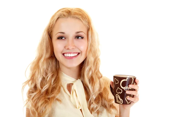 Cheerful young woman wih cup of tea or coffee — Stock Photo, Image