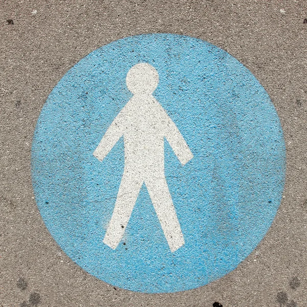 Sign for pedestrians in asphalt road — Stock Photo, Image