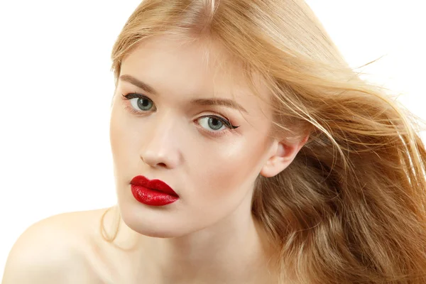 Beautiful woman face closeup with long blond flying hair and vivid red lipstick — Stock Photo, Image