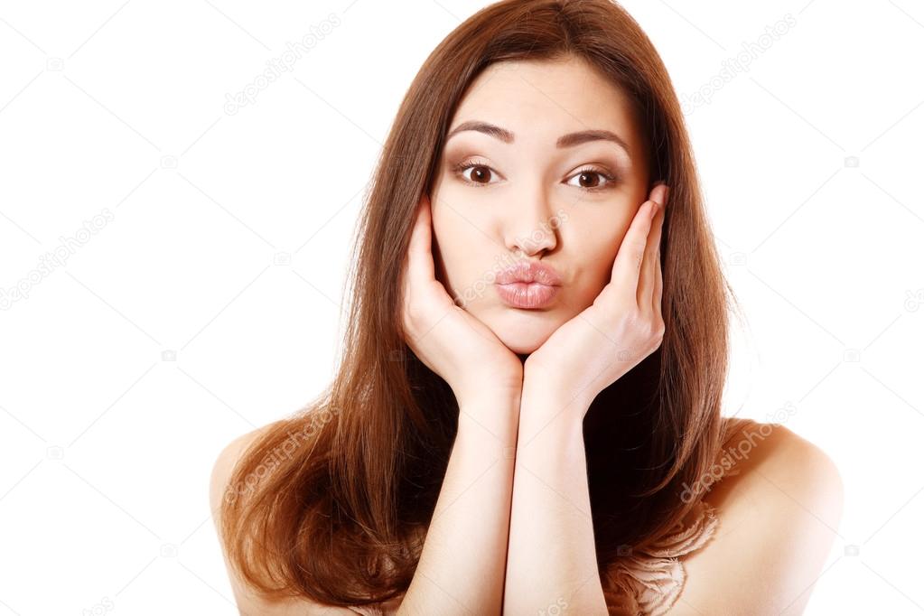 teen girl make faces with kiss looking at camera — Stock Photo ...
