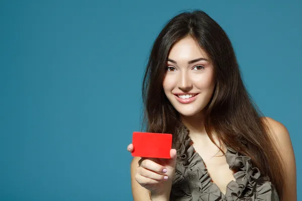 Teen girl showing red card — Stock Photo, Image