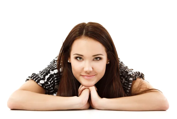 Young woman lying and looking at camera — Stock Photo, Image