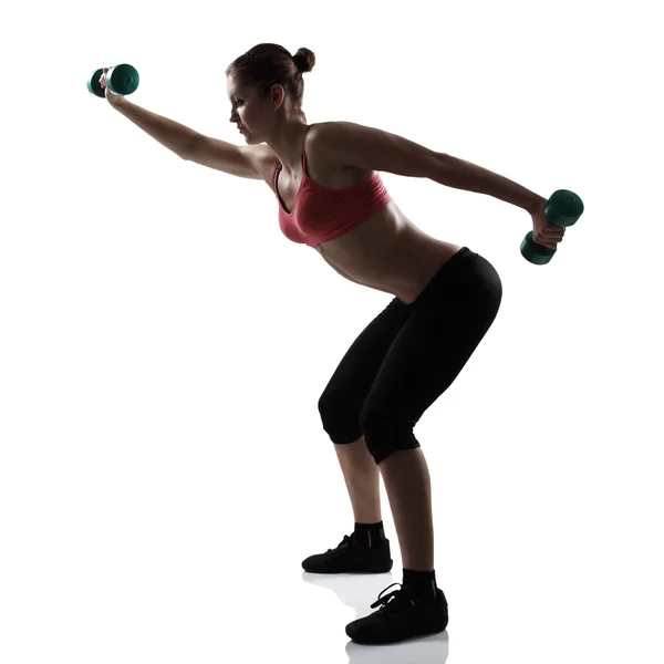 Sporty girl with dumbbells — Stock Photo, Image