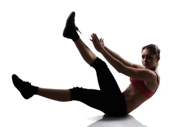 ABS ve bacaklar egzersiz yaparak spor kız
