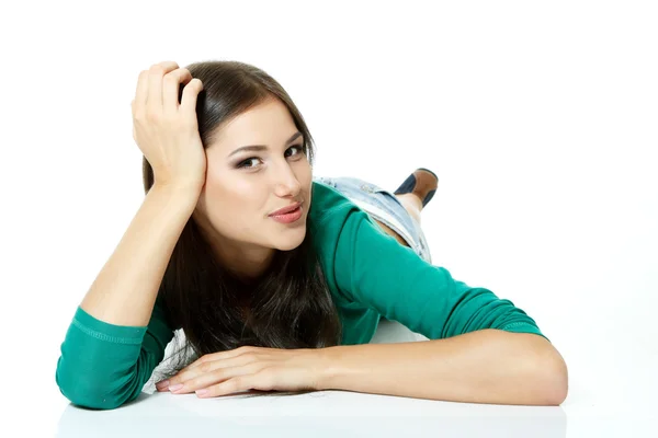 Teen girl lying down and smiling — Stock Photo, Image