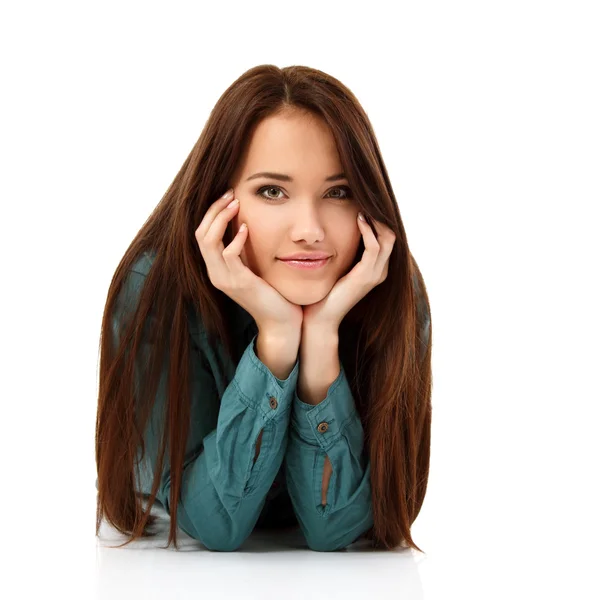 Young woman lying and looking at camera — Stock Photo, Image