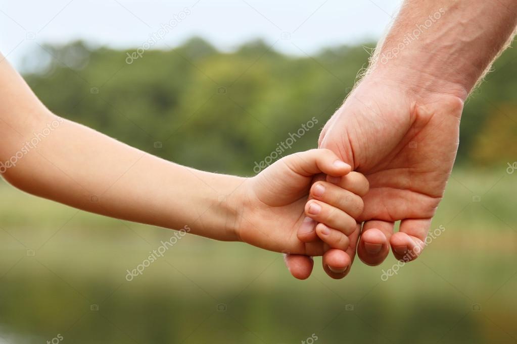 Father's hand lead his child son — Stock Photo © khorzhevska 38400703
