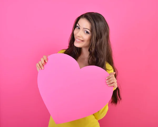 Young Joyful Woman Holding Large Paper Heart Smiling Pink Background — Stock Photo, Image