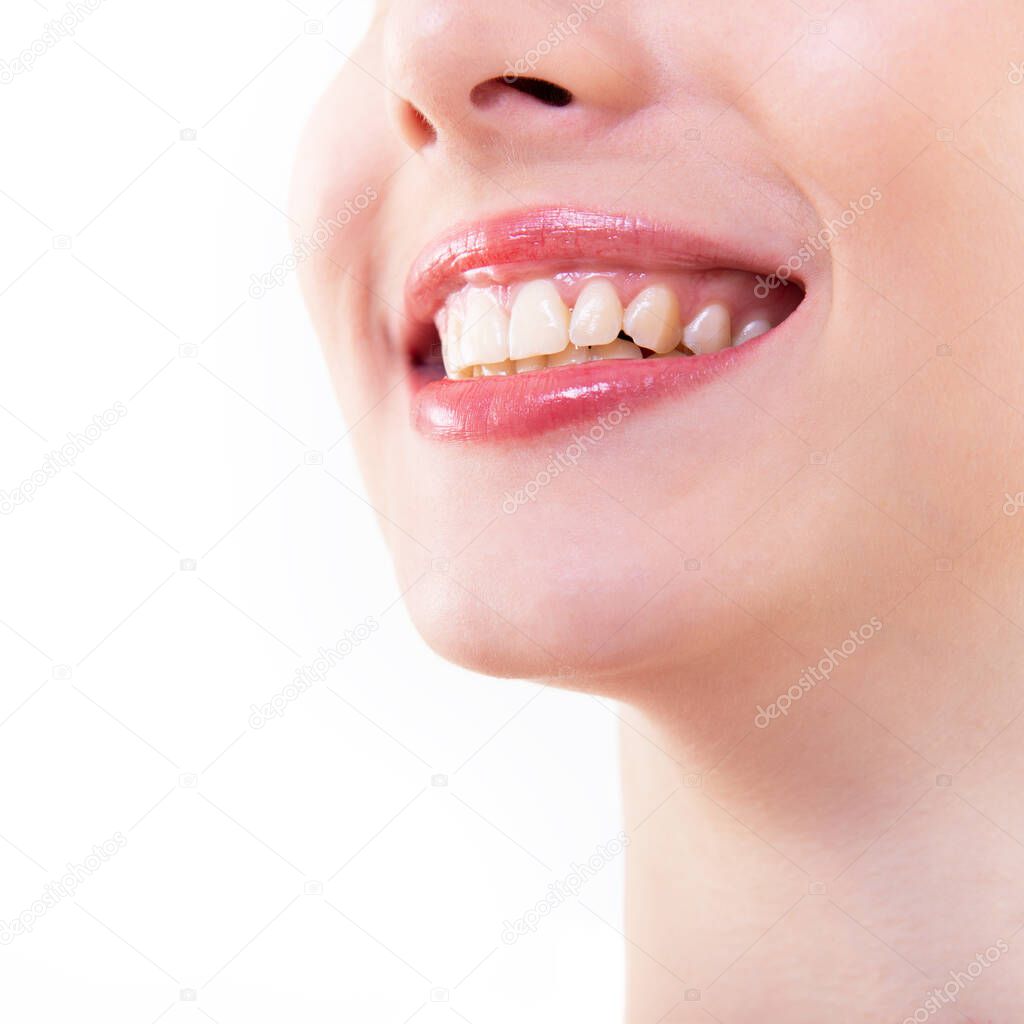 Smile. healthy and beautiful. Laughing woman, female mouth with great teeth over white background. Teeth health, whitening, prosthetics and care. Happiness and joy