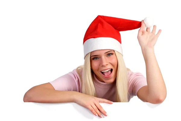 Kvinna som bär en santa hatt — Stockfoto