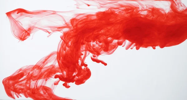 Tinta roja en el agua — Foto de Stock