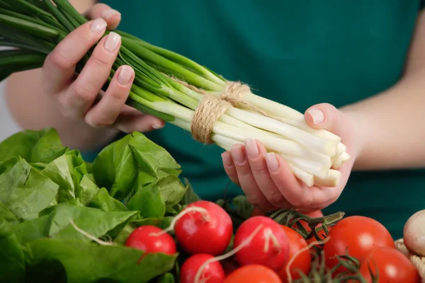 Woma selling fresh vegetables — Stock Photo, Image