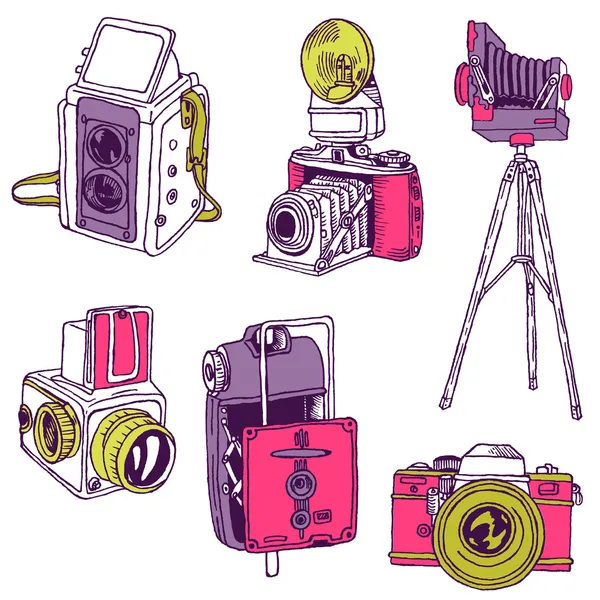 Conjunto de cámaras de fotos - garabatos dibujados a mano en el vector — Vector de stock
