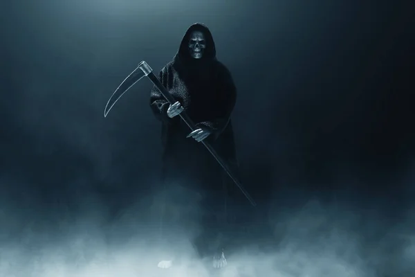 Grim reaper on dark background