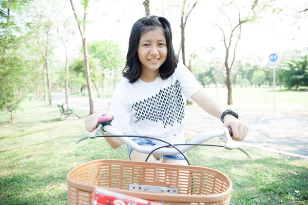 Young woman bicycling. — Stock Photo, Image