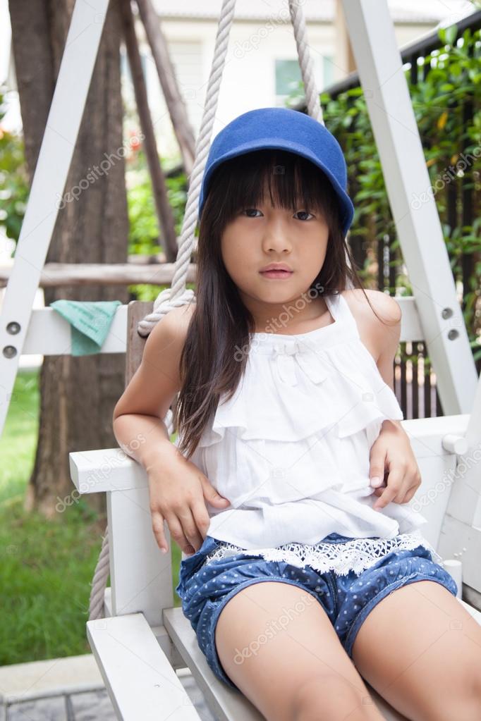 Girl Sitting On A Swing Stock Photo Girl Sitting On A Swing Stock Photo