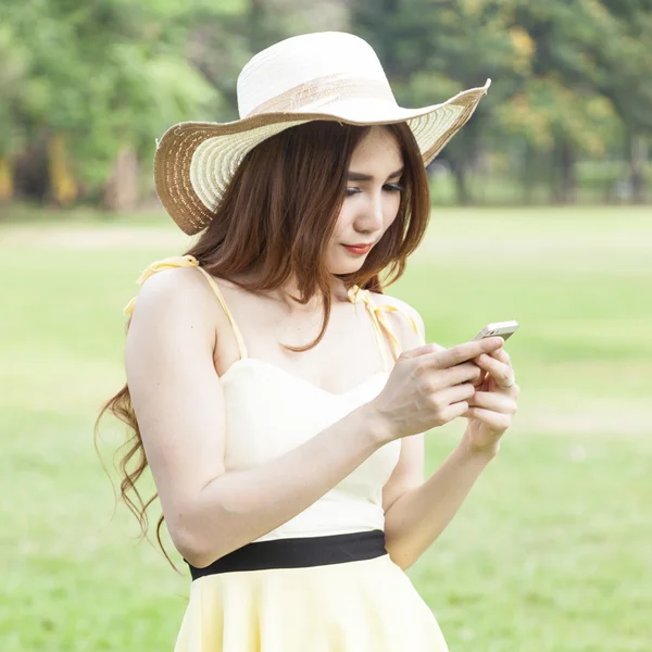Woman playing smart phone. — Stock Photo, Image
