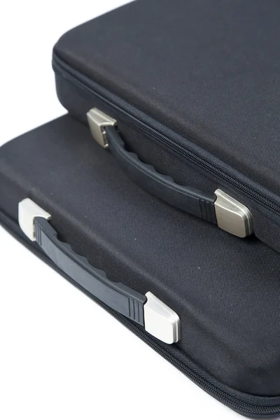 Black briefcase overlapping. — Stock Photo, Image