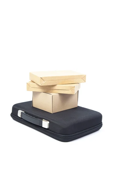 Many brown paper box on a black briefcase. — Stock Photo, Image